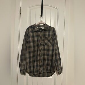 Nike SB  Black and Tan Plaid long sleeve button down shirt. The size is Large